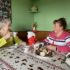Mother and daughter enjoying afternoon tea with their Uccello Kettle