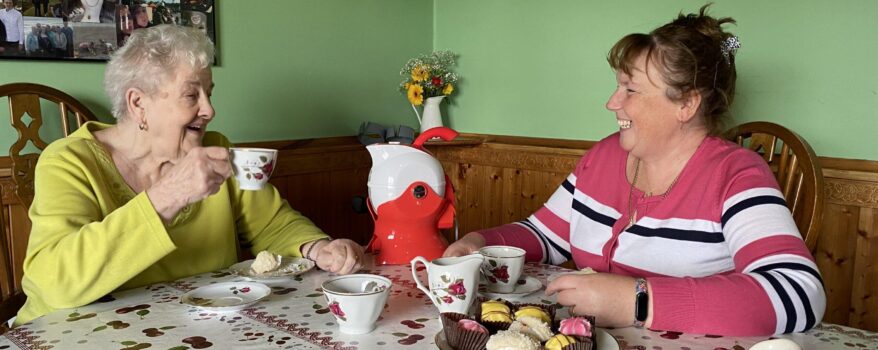 Mother and daughter enjoying afternoon tea with their Uccello Kettle