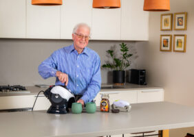 Elderly man making coffee with the Uccello Kettle