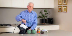 Elderly man making coffee with the Uccello Kettle