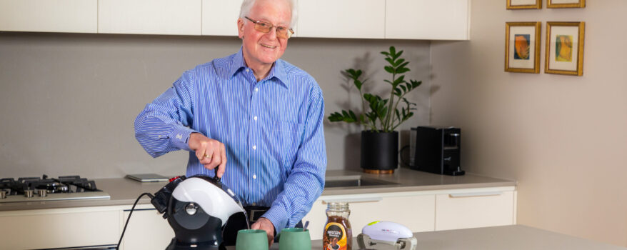 Elderly man making coffee with the Uccello Kettle