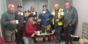 Members of the Kilmacrenan Men's Shed enjoy a cup of tea together with the Uccello Kettle