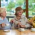 Elderly women enjoying tea together